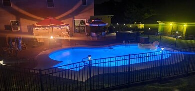 Salt water pool  and cabana area, deck and dining 