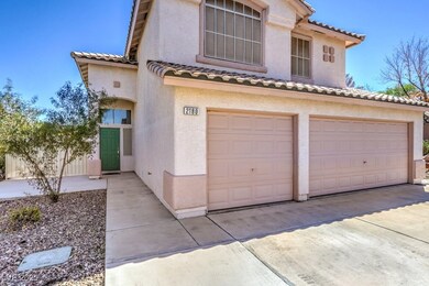View of front of property with stucco siding, an a