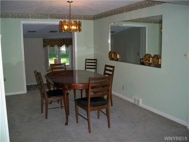 Dining Room. The formal dining rm opens onto the l