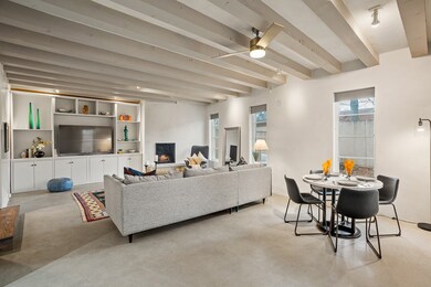 Sleek concrete floors and plaster walls