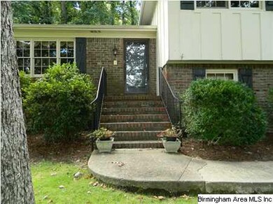 This home has mature landscaping surrounding the e