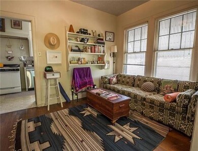 Sitting room with wood finished floors