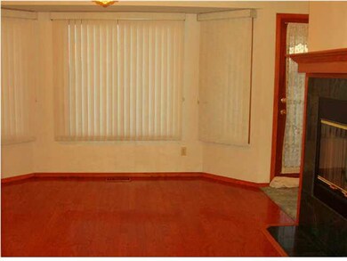 Eating area in kitchen/hearth area has beautiful h