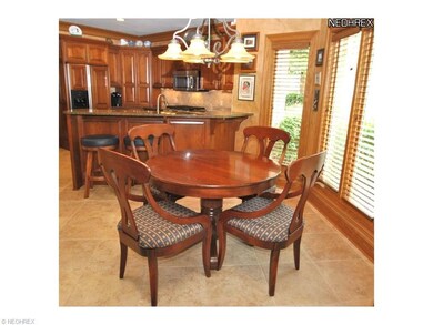 The bayed eating area has custom lighting fixture 