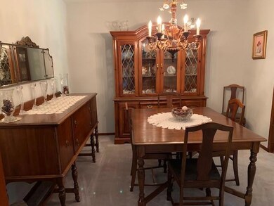 Formal dining room adjacent to breakfast room