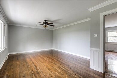 The spacious living room is bright and inviting an