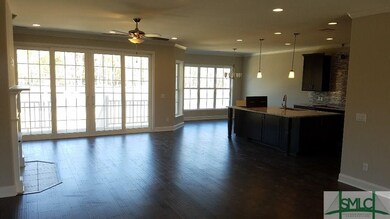 Living Room and Kitchen with plenty of natural lig