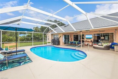 Outdoor pool with outdoor lounge area, a sunroom, a lanai, a ceiling fan, and a patio area