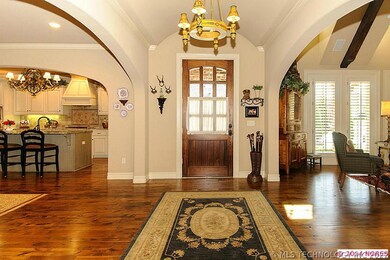JUST INSIDE THE ENTRY, YOU WILL FIND HAND SCRAPED
