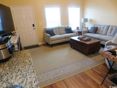 Living room with wood finished floors