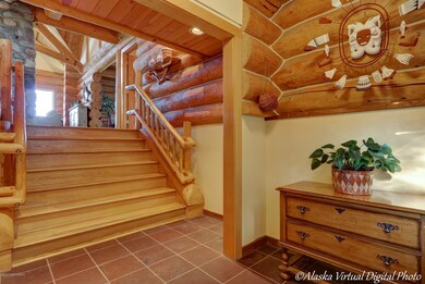 Stunning tile & log foyer