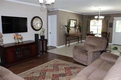LIVING ROOM: NEWER LAMINATE FLOORING