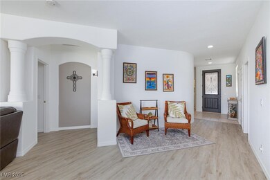 Living area featuring light wood finished floors,