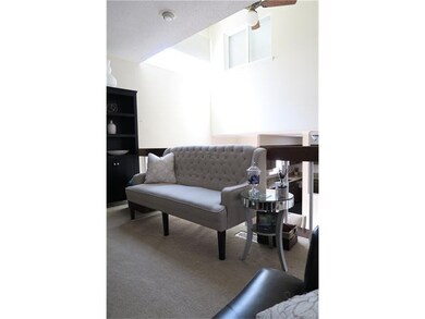 The First Level Overlooks Dining Room With Vaulted