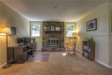 Den with Fireplace.