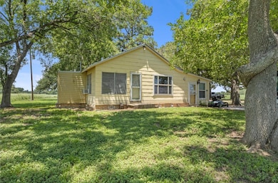 View of front facade featuring crawl space and a 