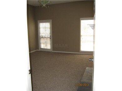 Master with fireplace and exit to rear yard