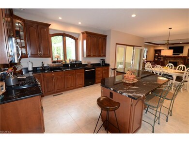 A gorgeous kitchen with granite tops, ceramic tile