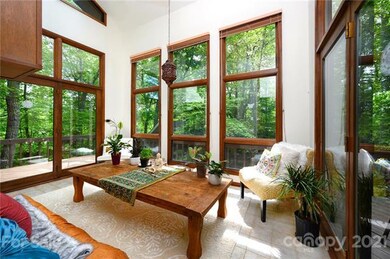 Sunroom Overlooks Park-like Yard and Opens to Wrap