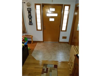 Step inside to the ceramic foyer entrance area and