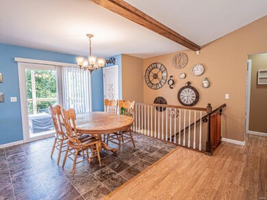 Kitchen and Breakfast Room Open to Vaulted Great R