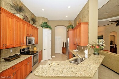 Spacious kitchen with granite tops, stainless stee