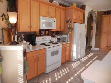 Kitchen. Loads of Cabinets in this Efficient Kitch
