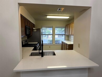 Kitchen featuring stainless steel range with gas 