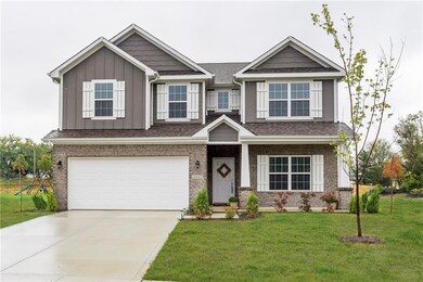 This Craftsman style exterior gives this home a touch of classic charm.  You'll love its cul-de-sac location and lush tree line to the north. No home behind you for privacy!