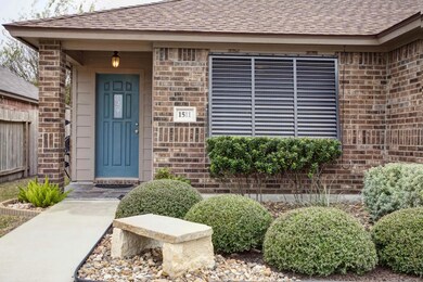 Nicely landscaped entry...