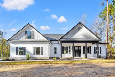 View of front of property with covered porch