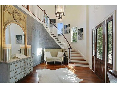 Foyer. Venetian Plaster accent wall in grand foyer