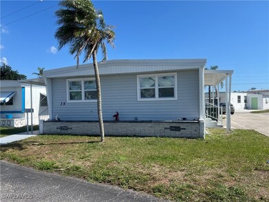 View of front of home featuring a front lawn