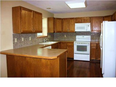 Updated Kitchen with Title back splash, hardwood f