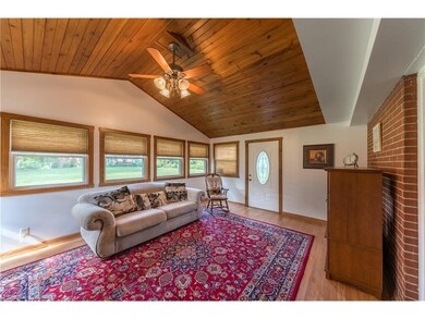 Sun room with exterior access to back yard.