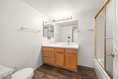 sink, open floor plan, light countertops, and a ce