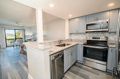 Beautiful view into Living room - wood floors throughout!