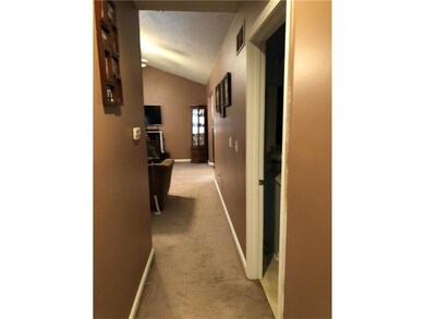 Hallway from living (leads to main bath/laundry, 2