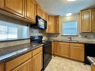 7226 Bubbling Brooks Ln, Houston, TX 77095 - photo 6