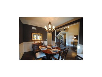 Dining room with hardwood flooring