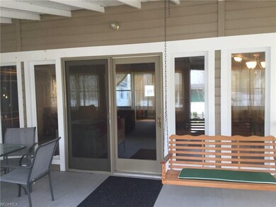 Beautiful wall of windows and entry door to main h