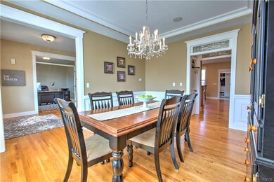 From the Dining Room you can easily access the Private Office or you can walk through the Butlers Pantry to the Kitchen and Mud Room which is conveniently located off of the 3 Car garage.