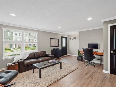 The space boasts wide-plank hardwood flooring, rec