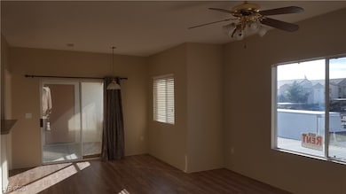 Unfurnished room with wood finished floors and a c