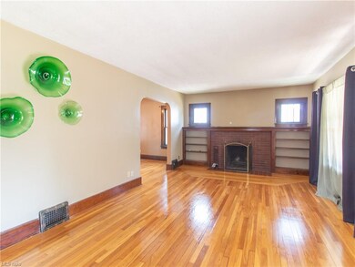 Gleaming hardwood floors in the living room with a