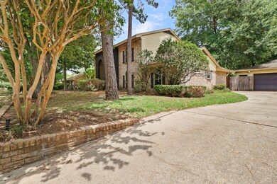 The extended driveway
leads to your over-sized de