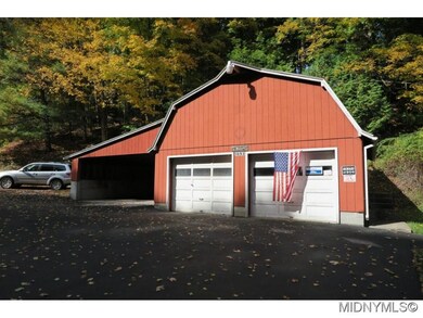 DETACHED GARAGE W/CARPORT