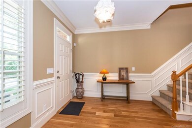 Enter into the Foyer with gorgeous wood work and b