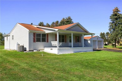 Featuring a huge, freshly painted front porch comp