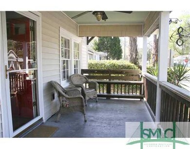 Porch. Classic deep front porch for evening wind-d